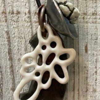 Trinket Necklace on Display | shop | Jenni Ward ceramic sculpture